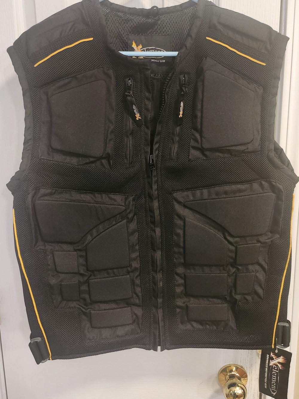 Xelement Men’s Black Tactical Protective Motorcycle Vest with Yellow Trim